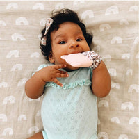 Itzy Mitt™ Silicone Teething Mitts: Bow