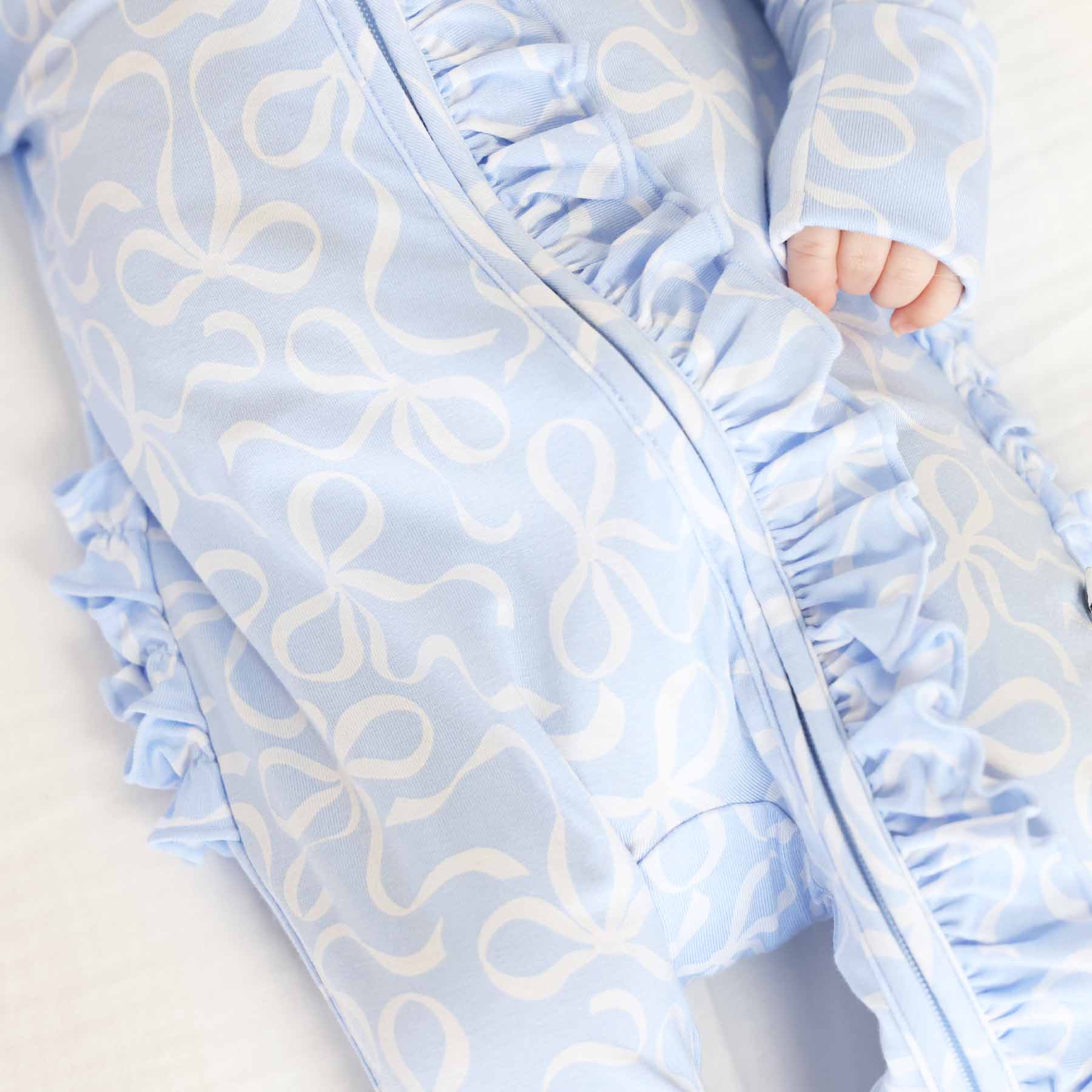 Blue-tiful Bows Ruffle Zipper Footie