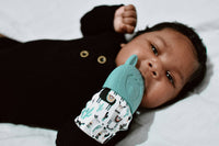 Itzy Mitt™ Silicone Teething Mitts: Bow