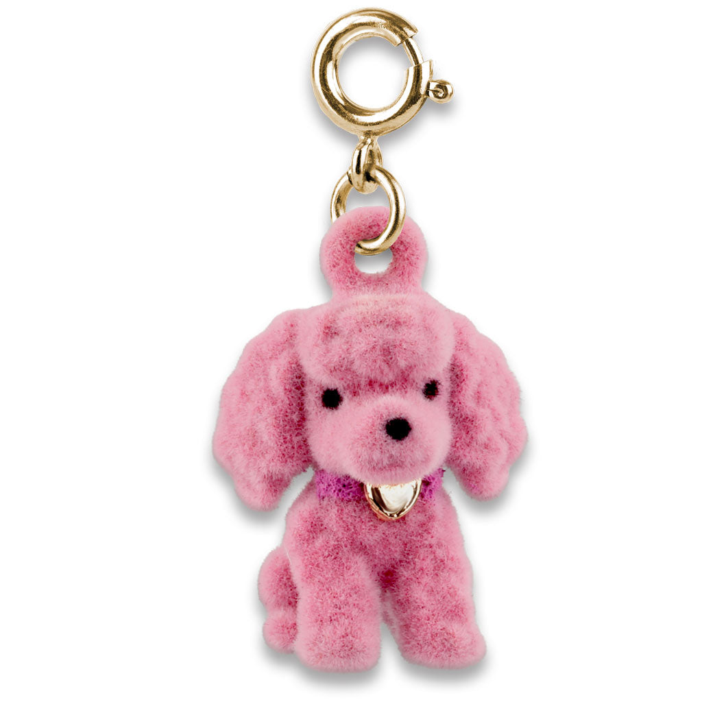 Pink plush dog charm with gold accents on a white background